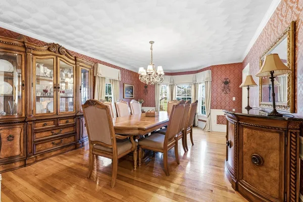a bathroom with a double vanity sink mirror and toilet