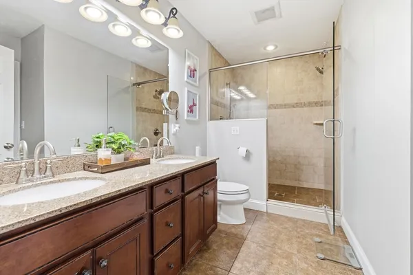 a room with furniture and wooden floor