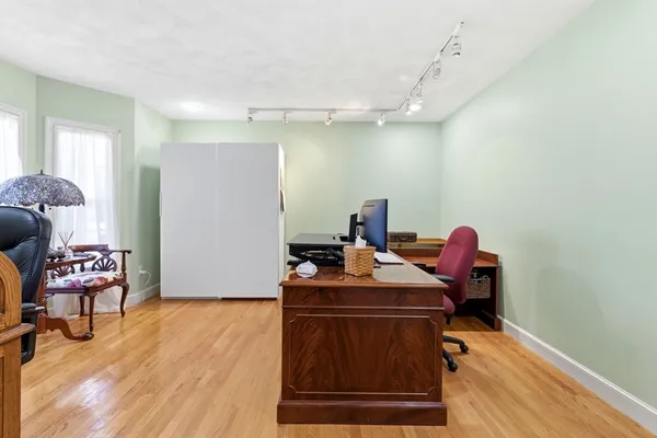a room with furniture and a large window