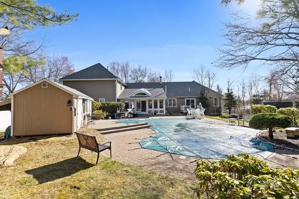 a view of a house with a swimming pool