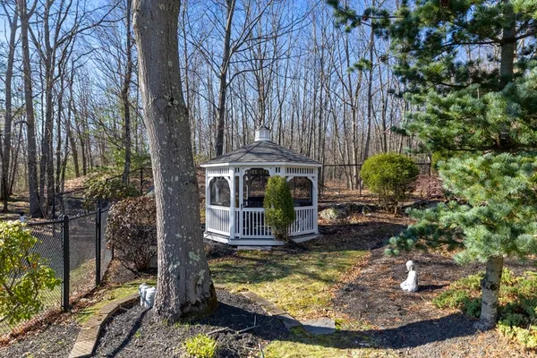 a backyard of a house with lots of green space