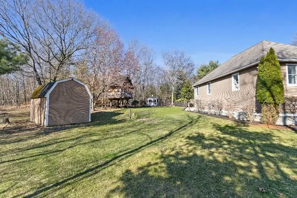 a view of a house with a ocean view