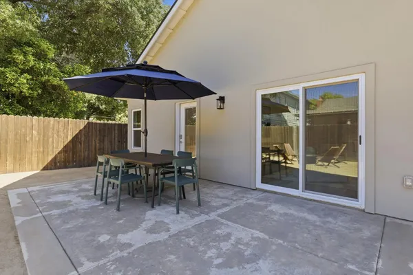 a view of a dinning table and chairs in the room