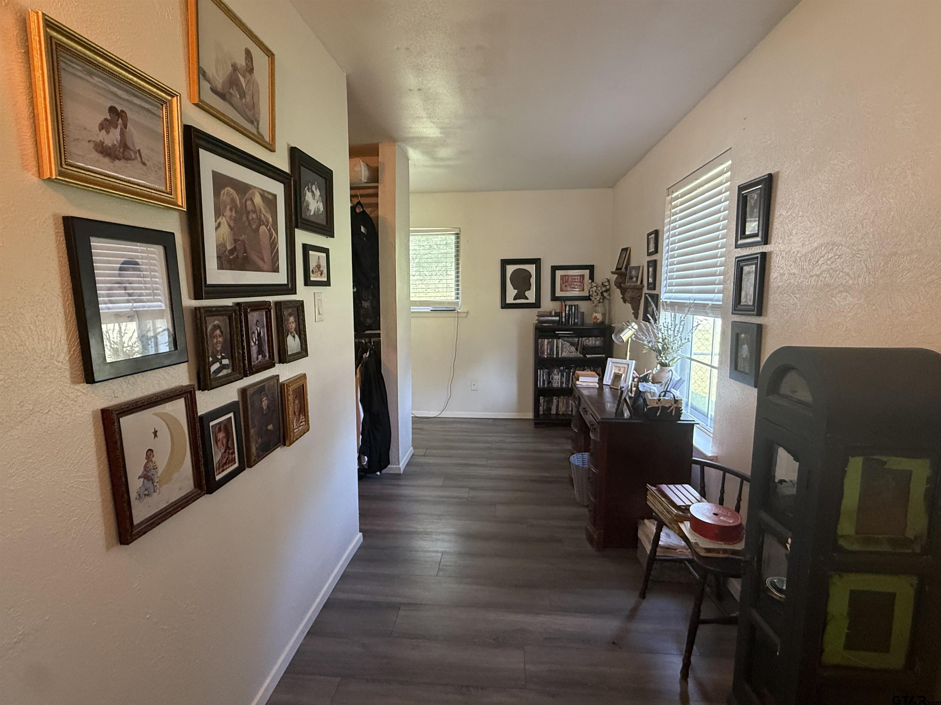 608 Pine Street Henderson, TX 75654 - Photo 17 of 46 a living room with furniture and wooden floor