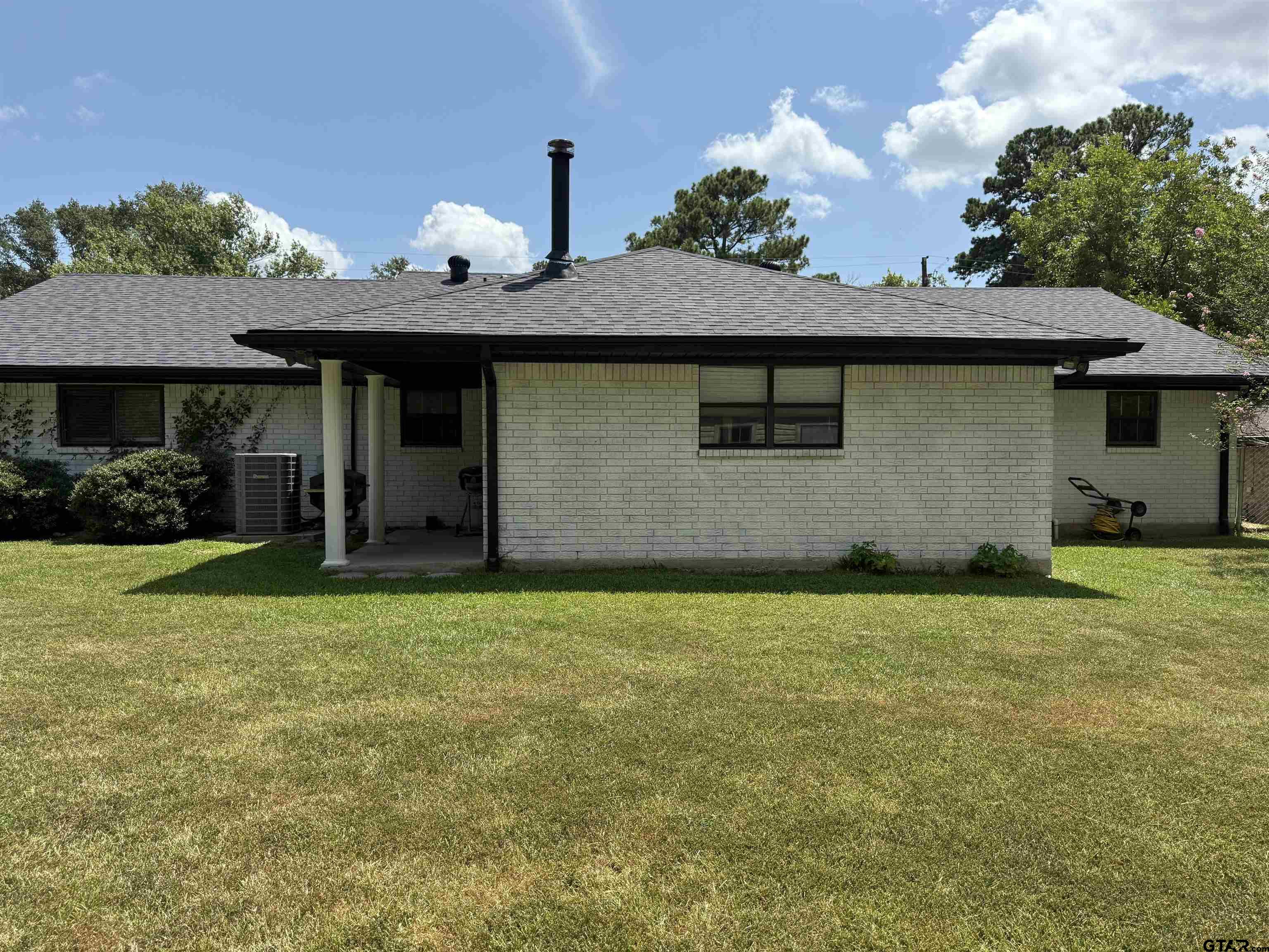 608 Pine Street Henderson, TX 75654 - Photo 19 of 46 a house view with a garden space