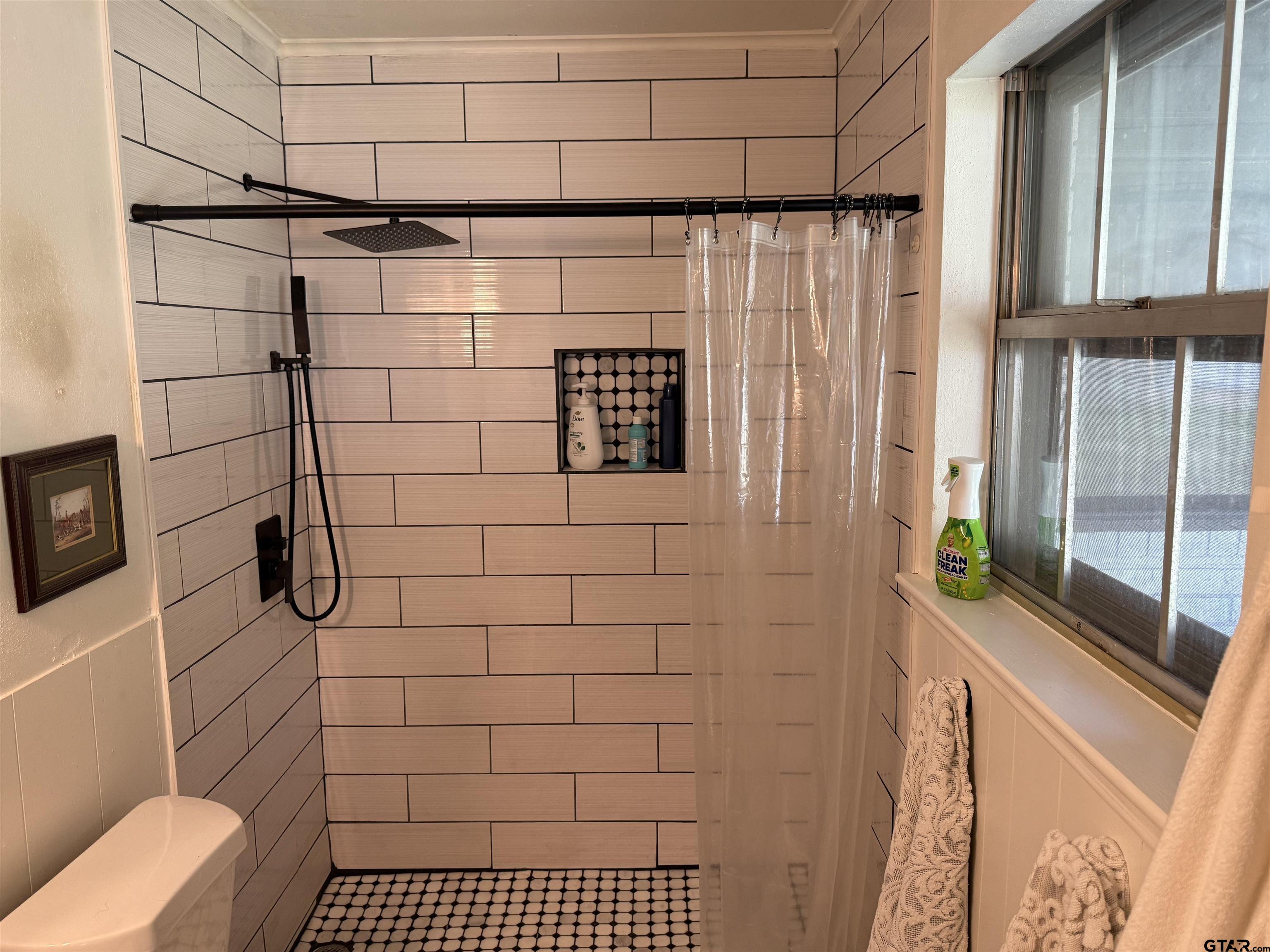 608 Pine Street Henderson, TX 75654 - Photo 45 of 46 a bathroom with a shower