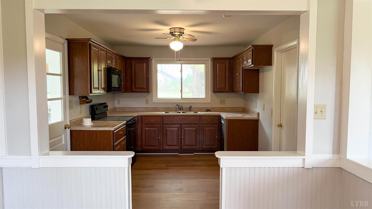 751 Long Island Road Gladys, VA 24554 - Photo 16 of 63 a kitchen with stainless steel appliances granite countertop a stove a sink and a refrigerator