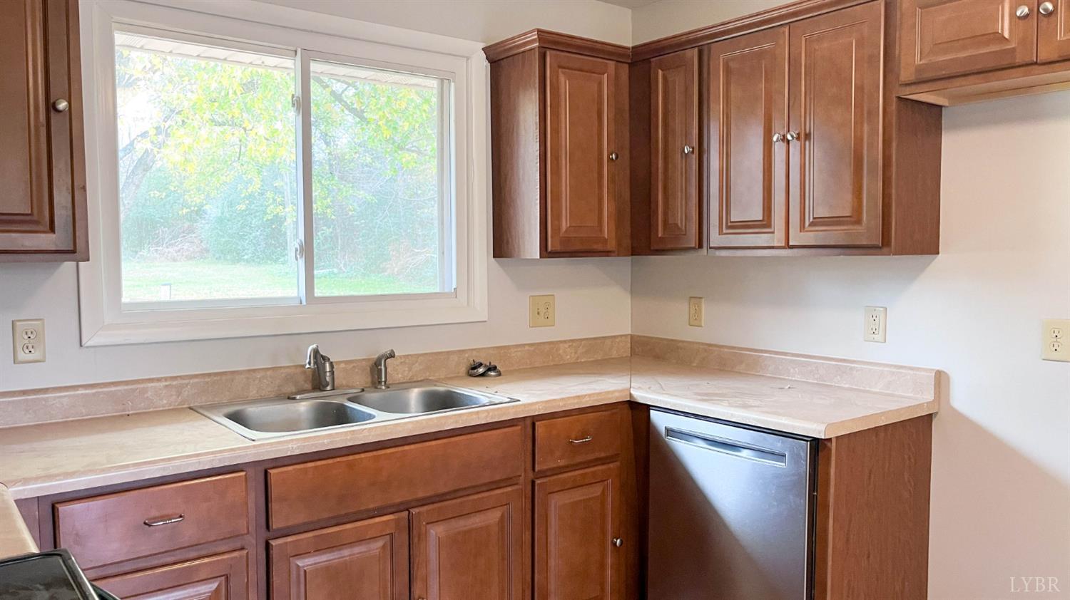 751 Long Island Road Gladys, VA 24554 - Photo 19 of 63 a kitchen with a sink cabinets and window