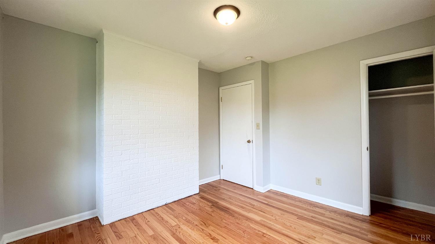 751 Long Island Road Gladys, VA 24554 - Photo 41 of 63 a view of room with wooden floor and closet