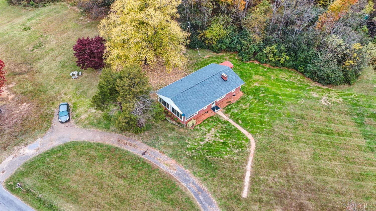 751 Long Island Road Gladys, VA 24554 - Photo 59 of 63 an aerial view of a house with a yard