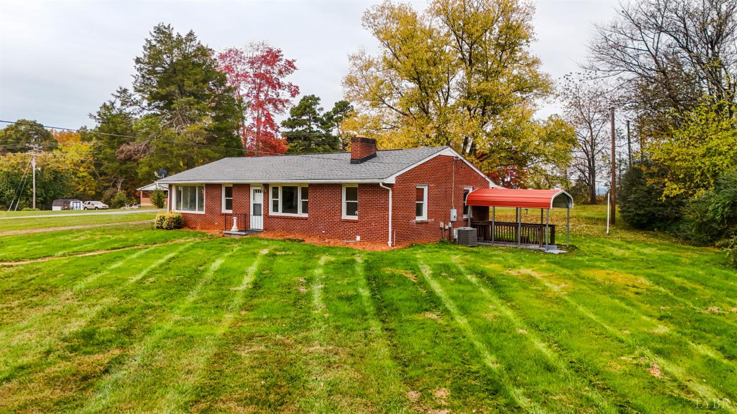 751 Long Island Road Gladys, VA 24554 - Photo 6 of 63 a view of a house with a big yard plants and large trees
