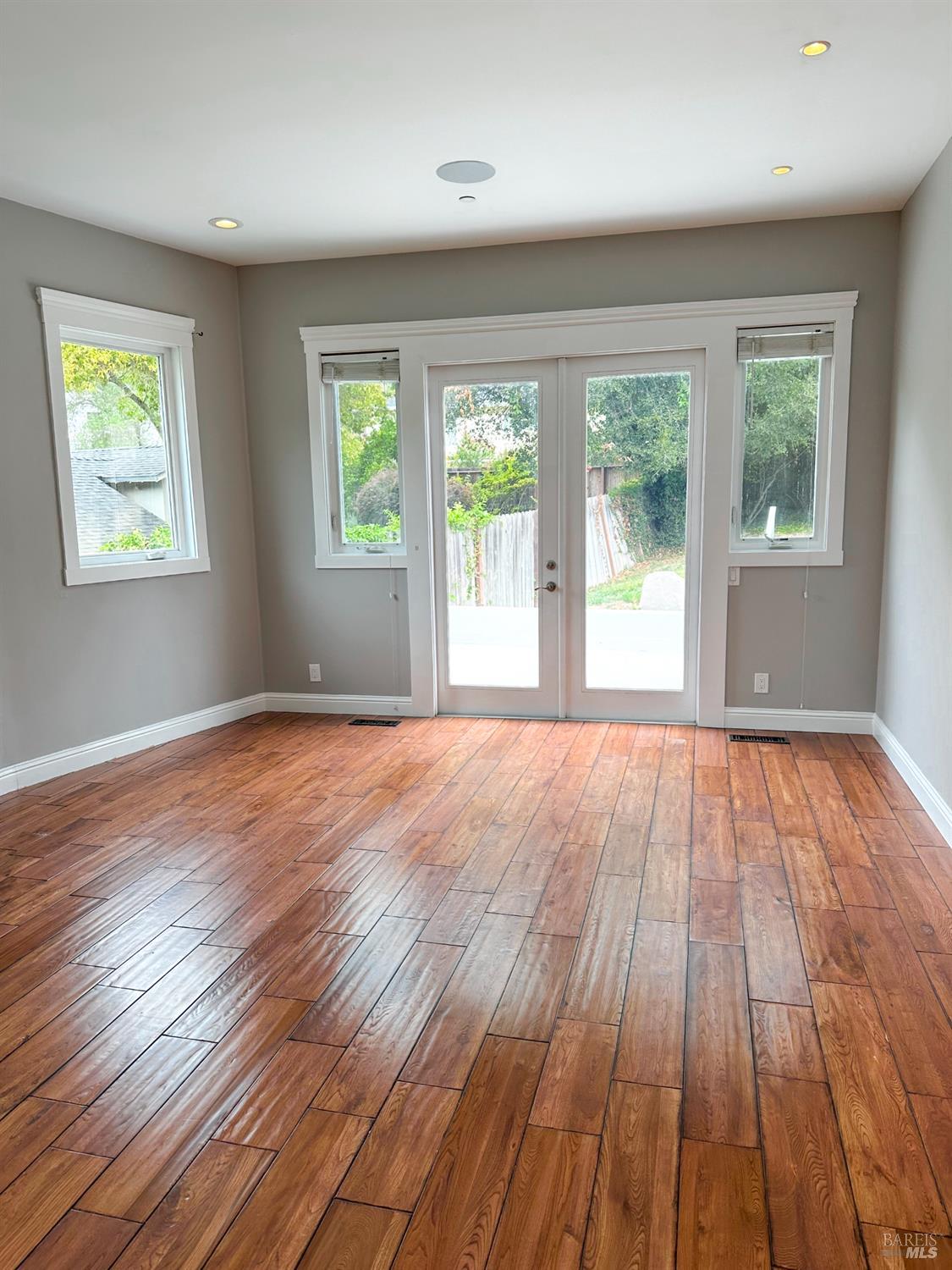 40 Villa Avenue San Rafael, CA 94901 - Photo 13 of 48 a view of an empty room with wooden floor and a window