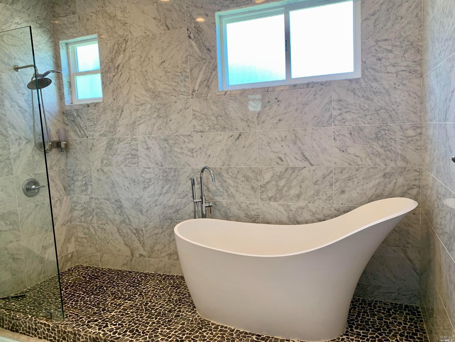 40 Villa Avenue San Rafael, CA 94901 - Photo 15 of 48 a white bath tub sitting in a bathroom