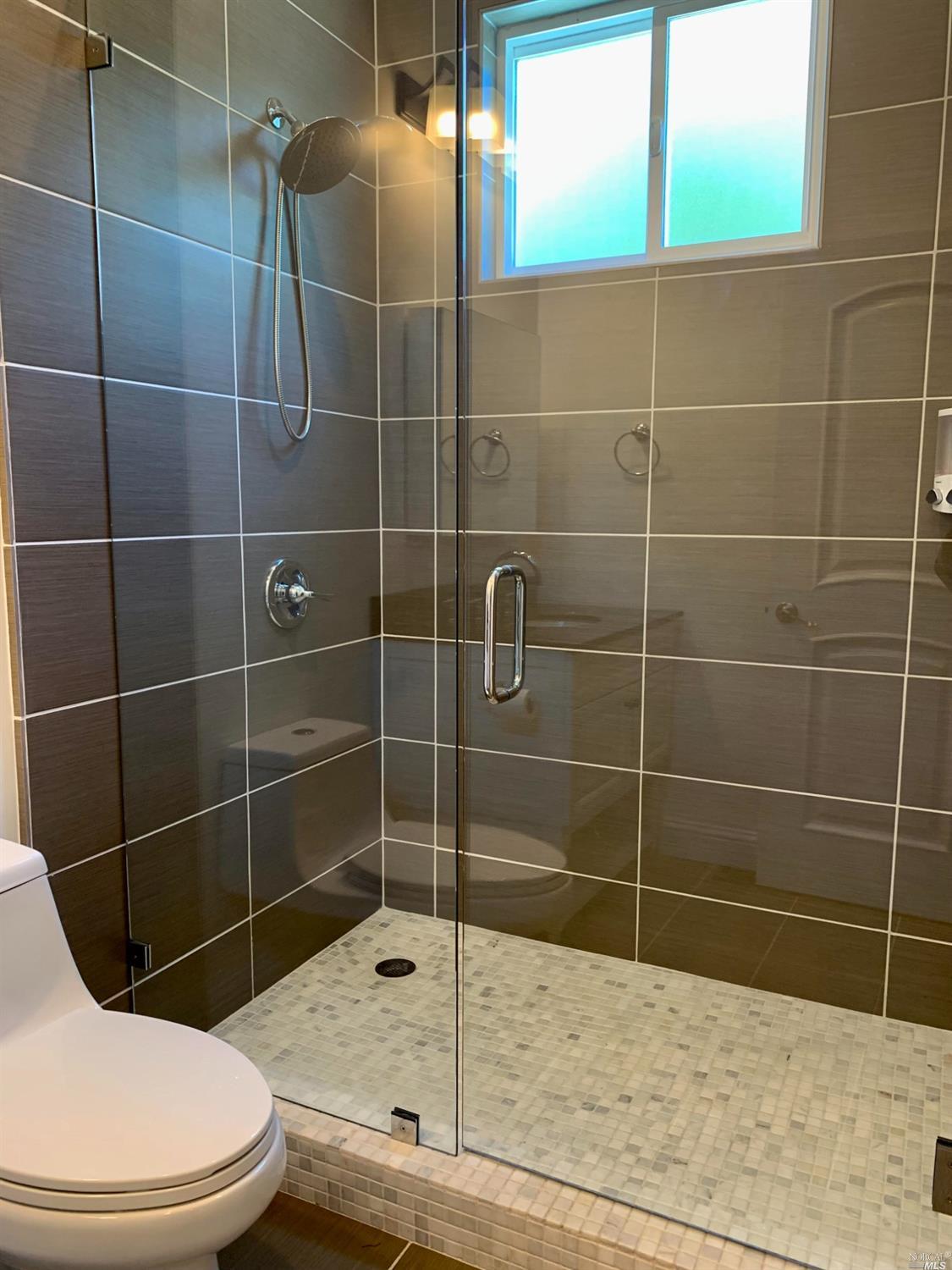 40 Villa Avenue San Rafael, CA 94901 - Photo 19 of 48 a bathroom with a toilet and a shower