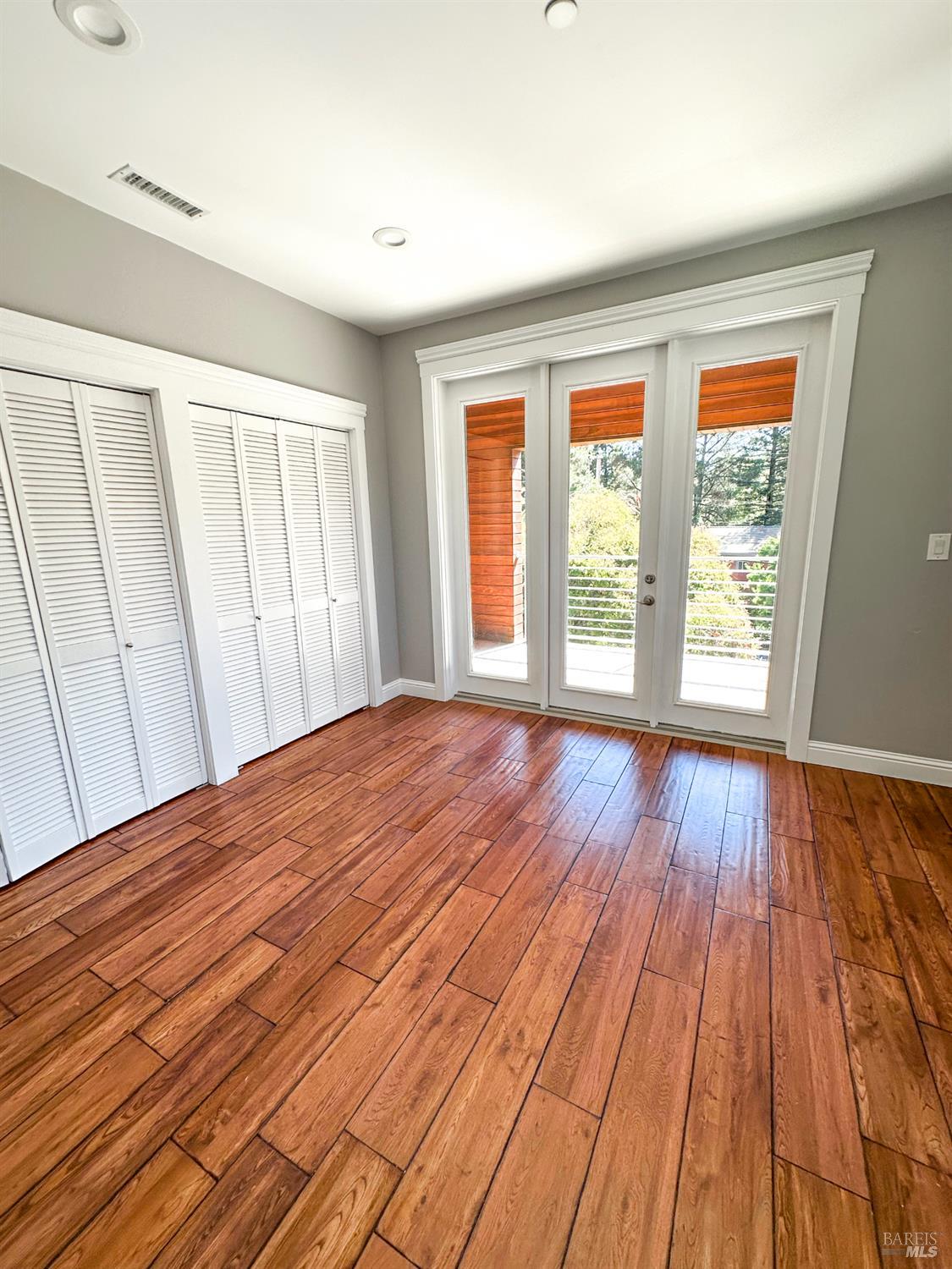 40 Villa Avenue San Rafael, CA 94901 - Photo 28 of 48 a view of an empty room with wooden floor and a window