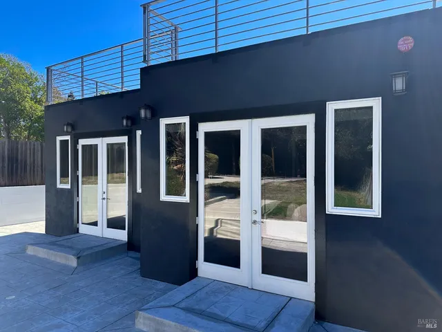 a view of a house with a large window