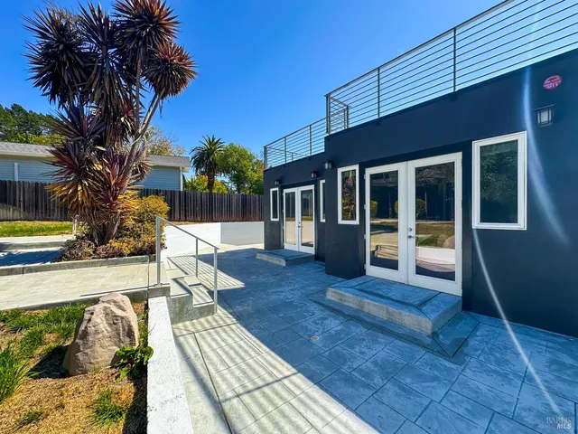 a view of a house with a patio