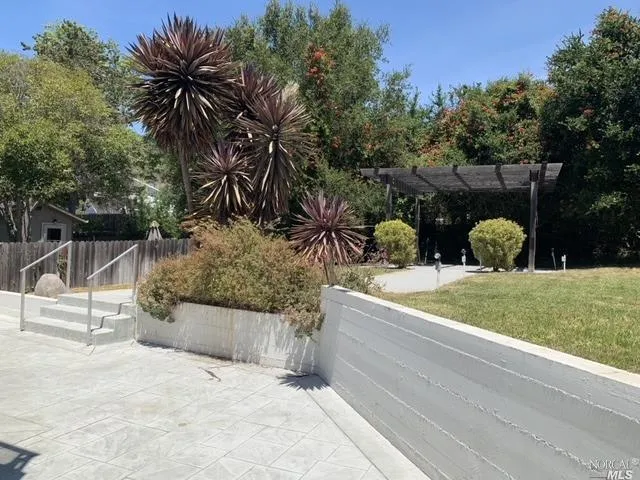 a house view with a outdoor space