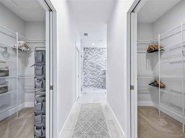 a bathroom with a sink a mirror and a shower