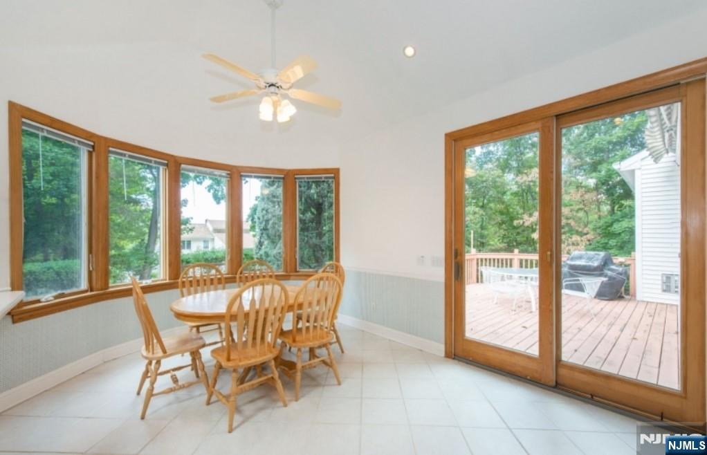 9 Forest Terrace Wayne, NJ 07470 - Photo 13 of 23 a dining room with furniture and large windows