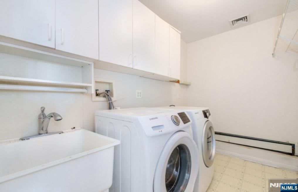 9 Forest Terrace Wayne, NJ 07470 - Photo 20 of 23 a utility room with dryer and washer