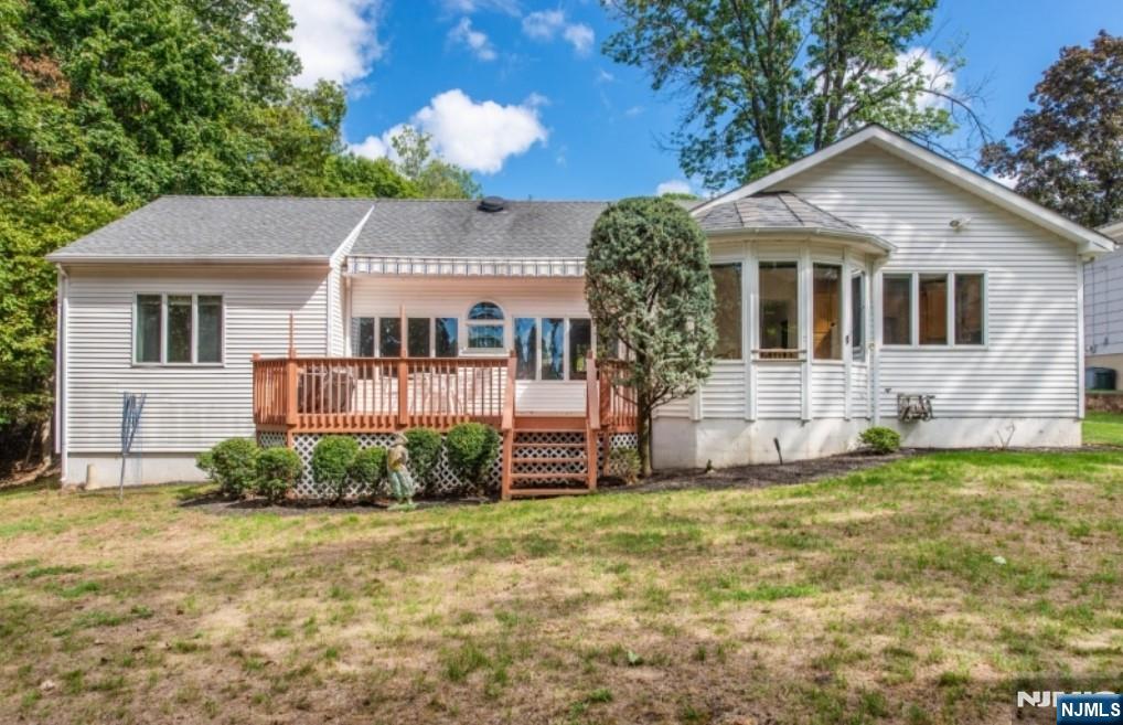 9 Forest Terrace Wayne, NJ 07470 - Photo 21 of 23 a front view of a house with a yard