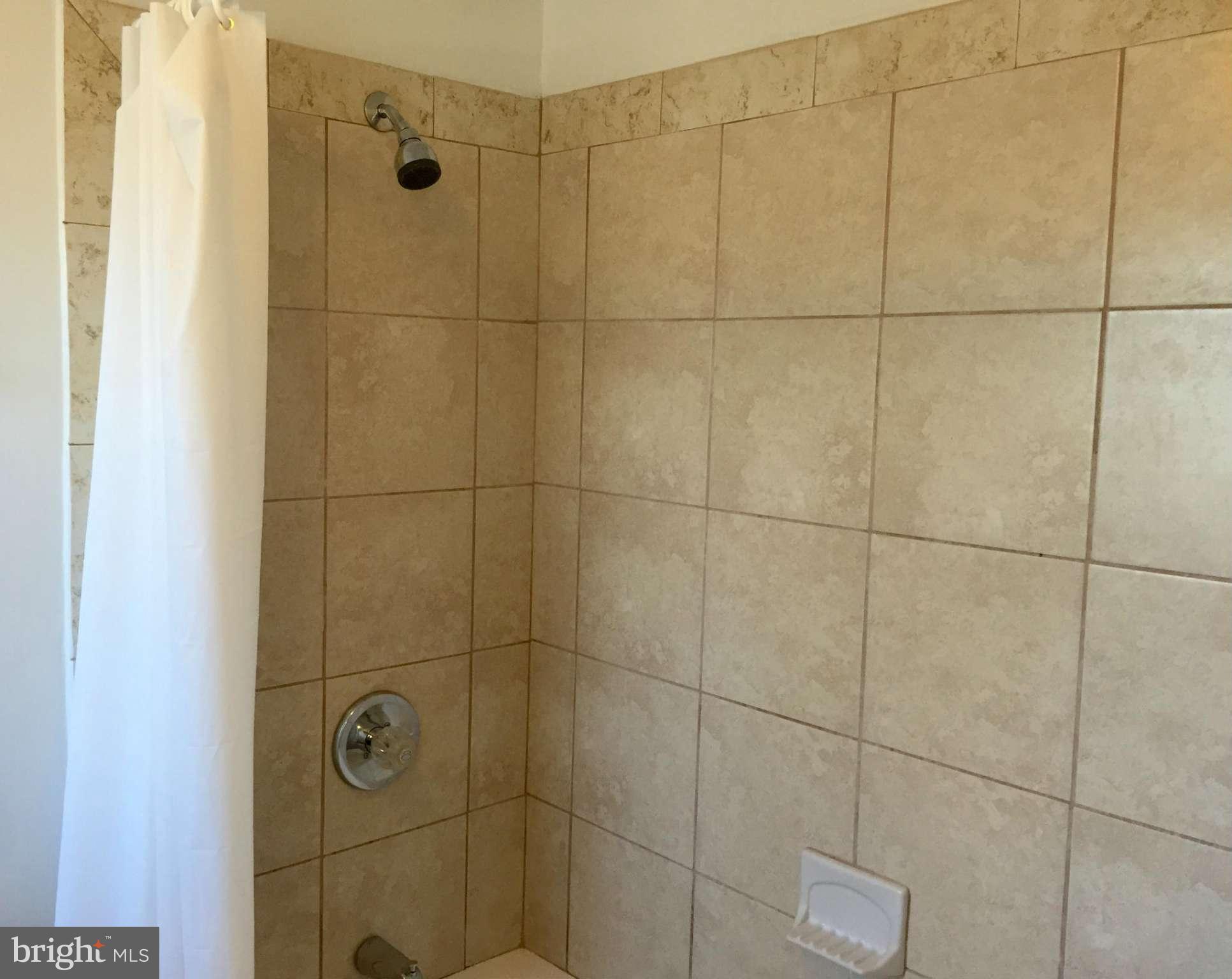 12612 Cedarbrook Lane Laurel, MD 20708 - Photo 21 of 22 a bathroom with a shower