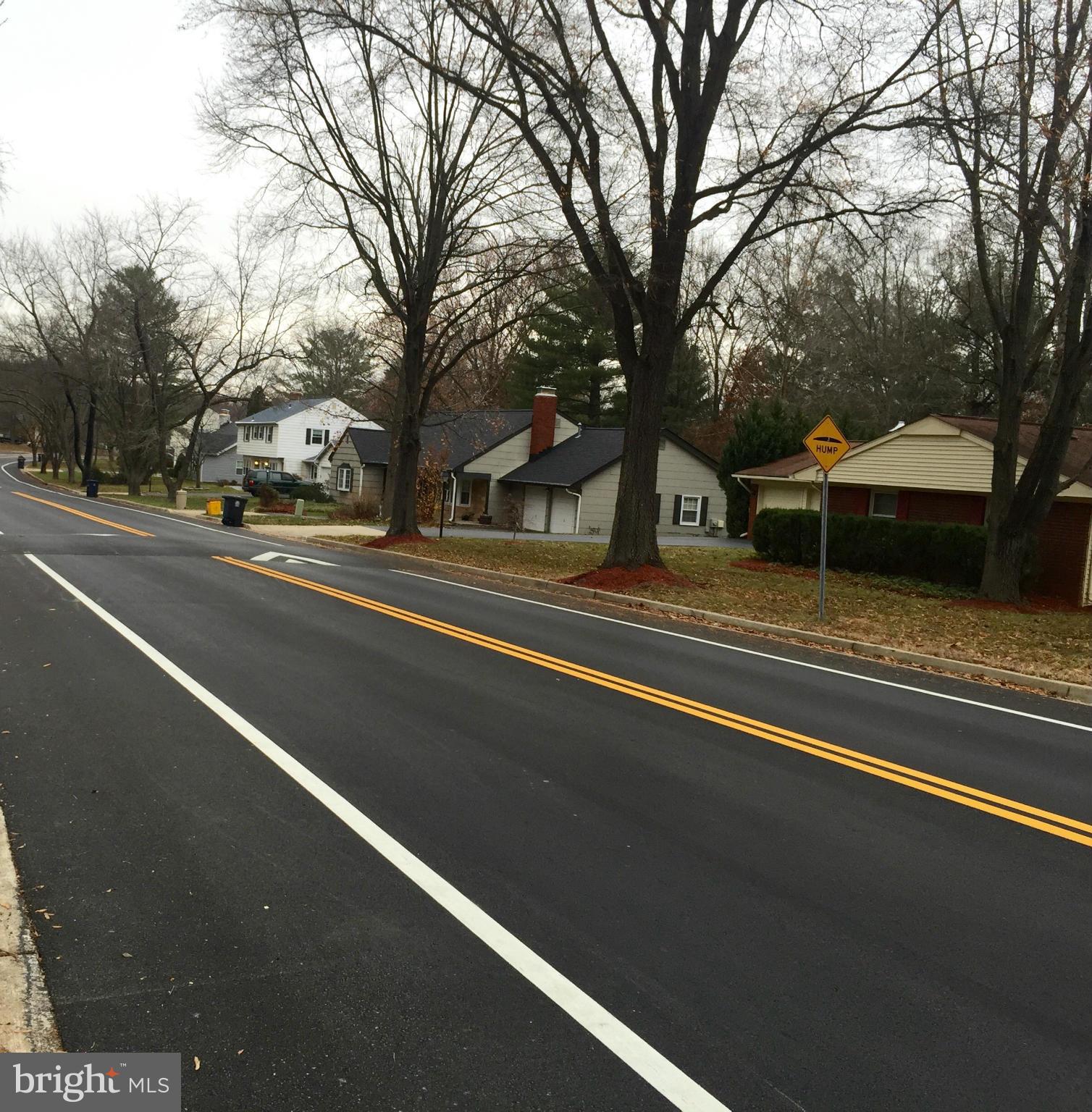 12612 Cedarbrook Lane Laurel, MD 20708 - Photo 9 of 22 a view of a city street with a building