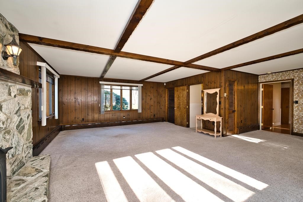 222 Blossom Road Westport, MA 02790 - Photo 17 of 37 a view of a hallway with wooden floor and furniture