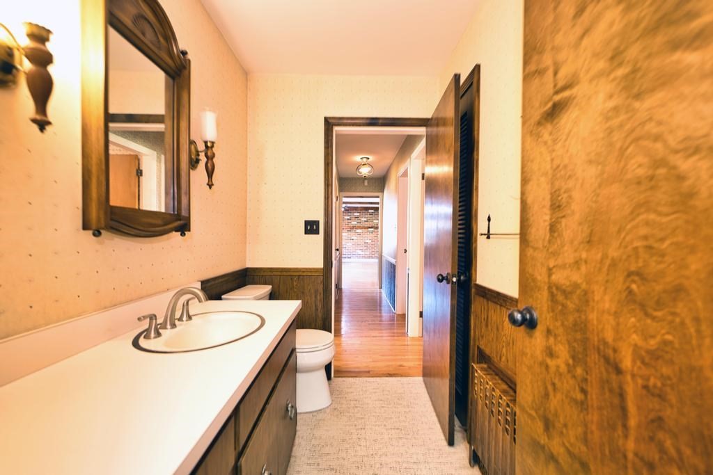 222 Blossom Road Westport, MA 02790 - Photo 19 of 37 a bathroom with a sink and a mirror