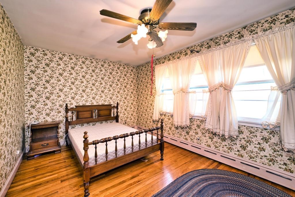 222 Blossom Road Westport, MA 02790 - Photo 21 of 37 a bedroom with a bed and window