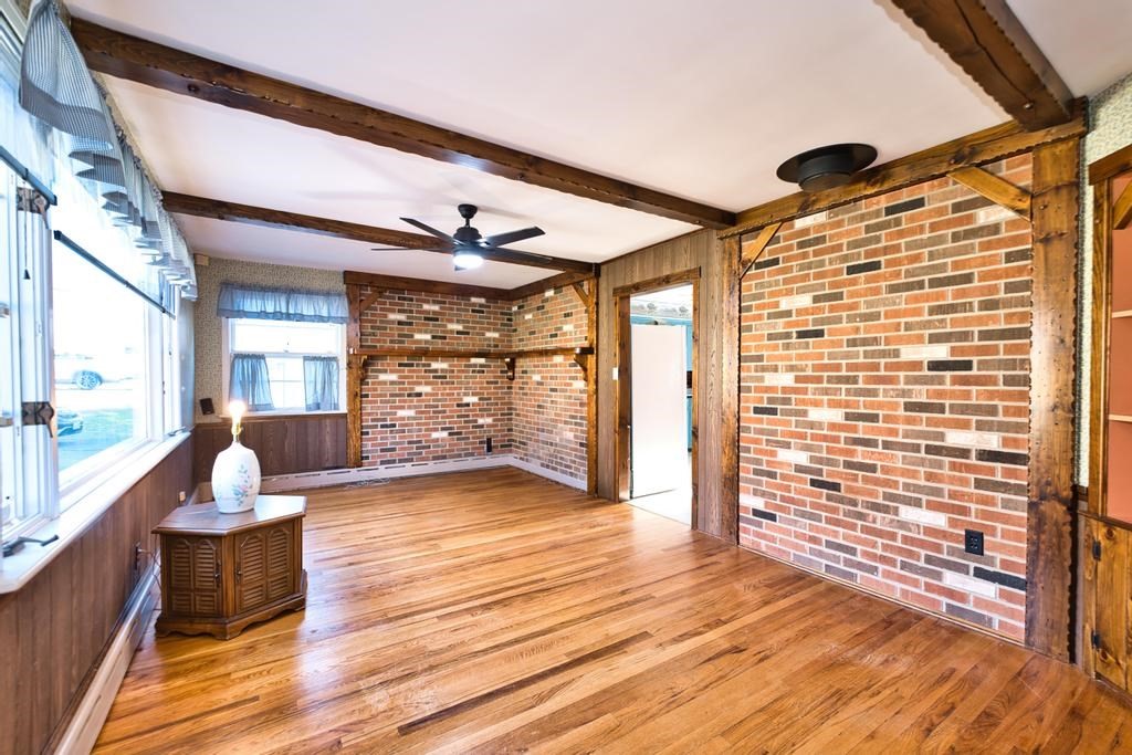 222 Blossom Road Westport, MA 02790 - Photo 22 of 37 a view of livingroom with furniture window and wooden floor