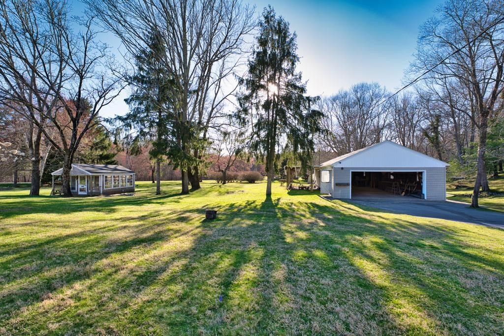 222 Blossom Road Westport, MA 02790 - Photo 31 of 37 a house view with swimming pool in front of it
