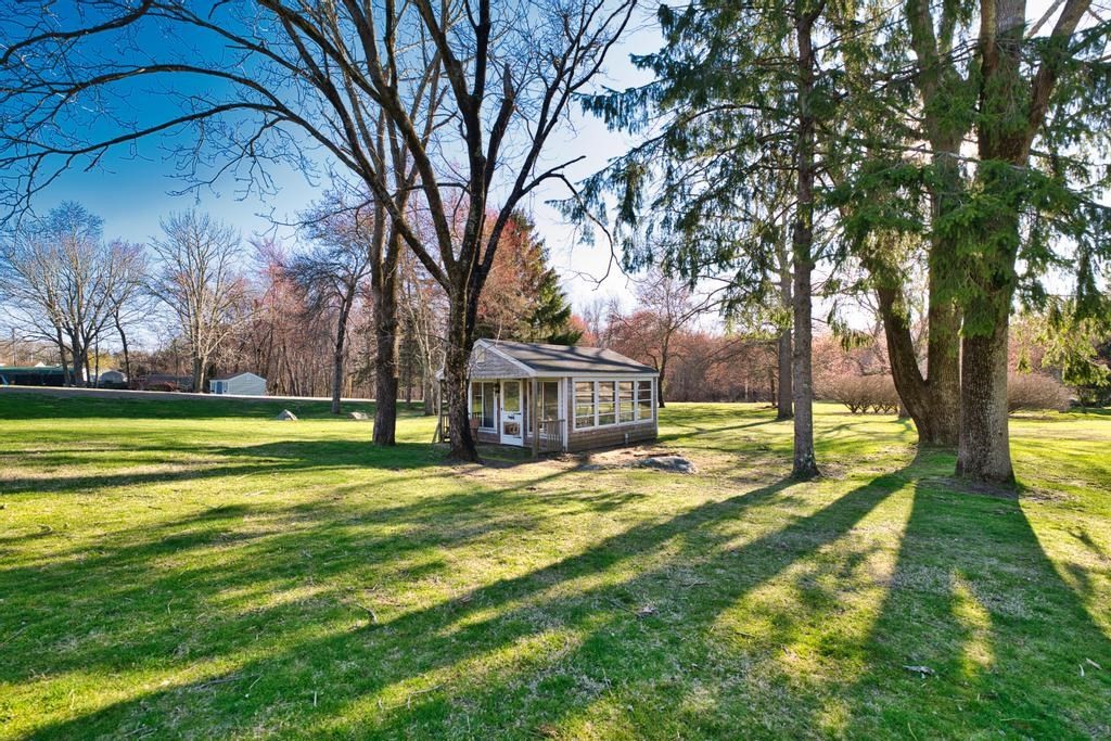 222 Blossom Road Westport, MA 02790 - Photo 32 of 37 a view of big yard with a trees