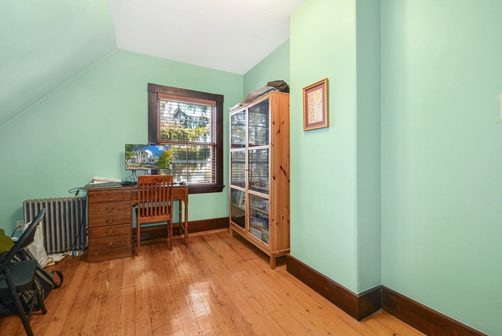 10 Middle Street, Unit 10 Newton, MA 02458 - Photo 16 of 19 a room with furniture and a window