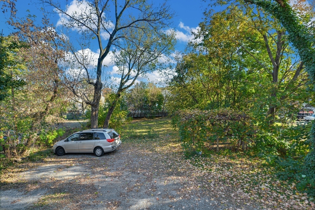 10 Middle Street, Unit 10 Newton, MA 02458 - Photo 18 of 19 a view of a car parked in a yard