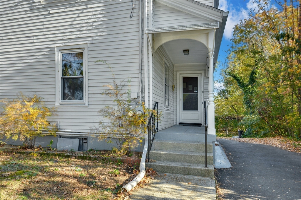 10 Middle Street, Unit 10 Newton, MA 02458 - Photo 2 of 19 a view of a door of the house
