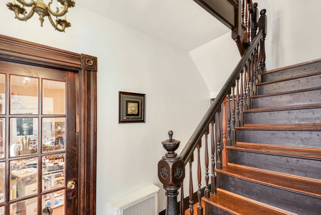 10 Middle Street, Unit 10 Newton, MA 02458 - Photo 3 of 19 a view of entryway and hall with wooden floor