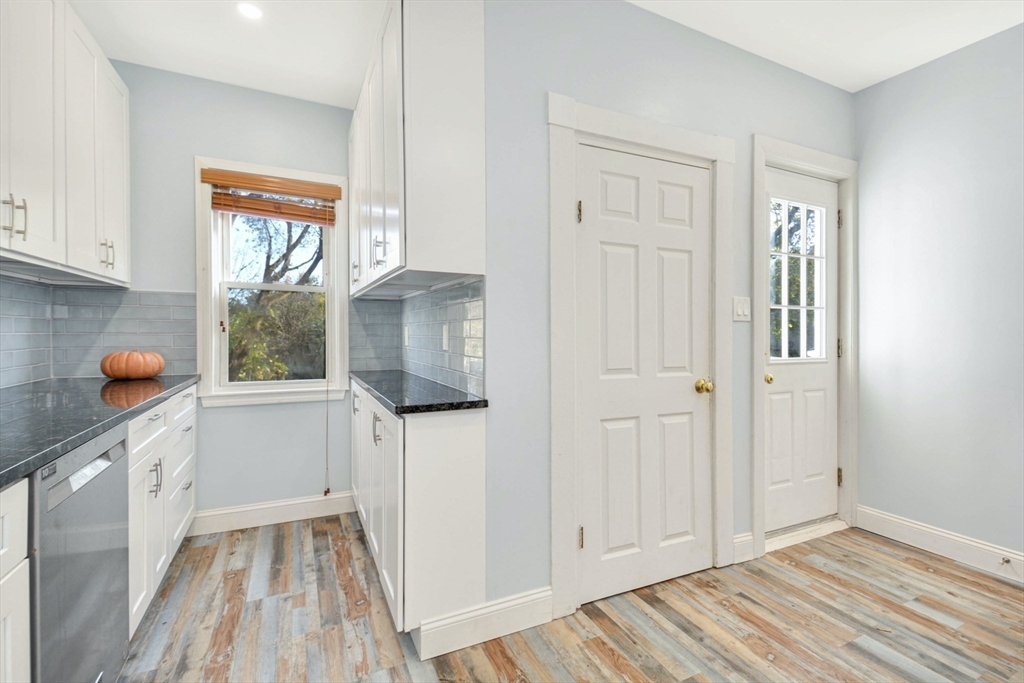 10 Middle Street, Unit 10 Newton, MA 02458 - Photo 8 of 19 a kitchen with a sink and wooden floor