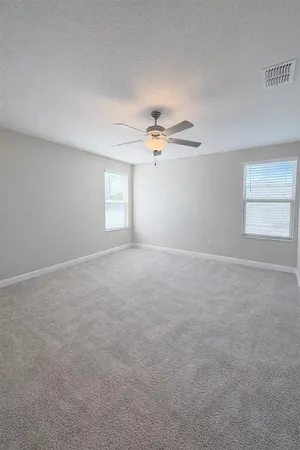 a view of a livingroom with a fan