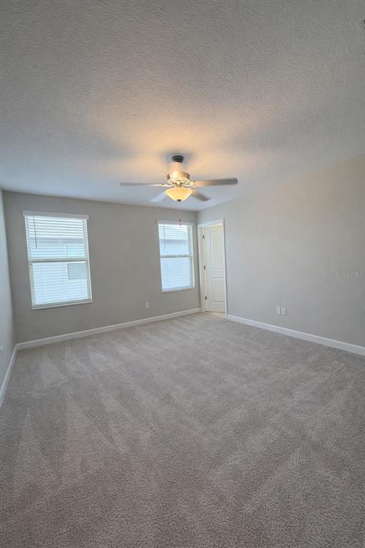 25118 Lambrusco Loop Lutz, FL 33559 - Photo 19 of 26 a view of empty room with window
