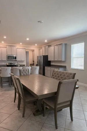 a view of a dining room with furniture