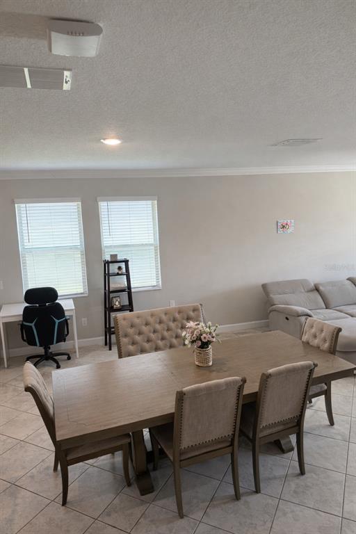 25118 Lambrusco Loop Lutz, FL 33559 - Photo 5 of 26 a dining room with furniture and window