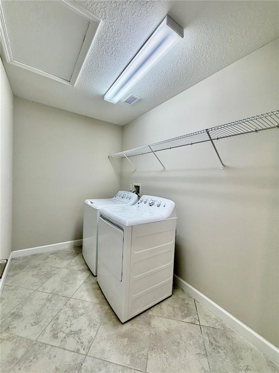 25118 Lambrusco Loop Lutz, FL 33559 - Photo 9 of 26 a utility room with a sink