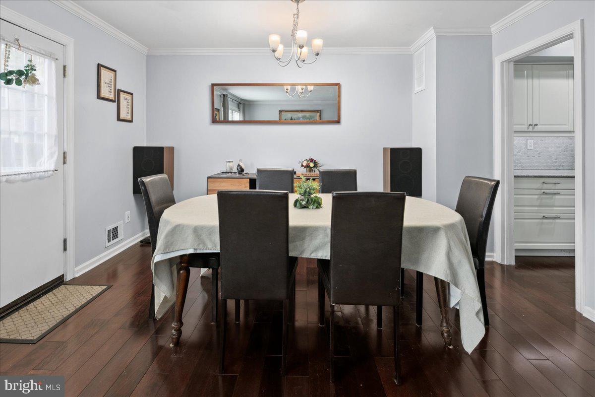 9623 Blake Lane Fairfax, VA 22031 - Photo 13 of 60 a view of a dining room with furniture and wooden floor