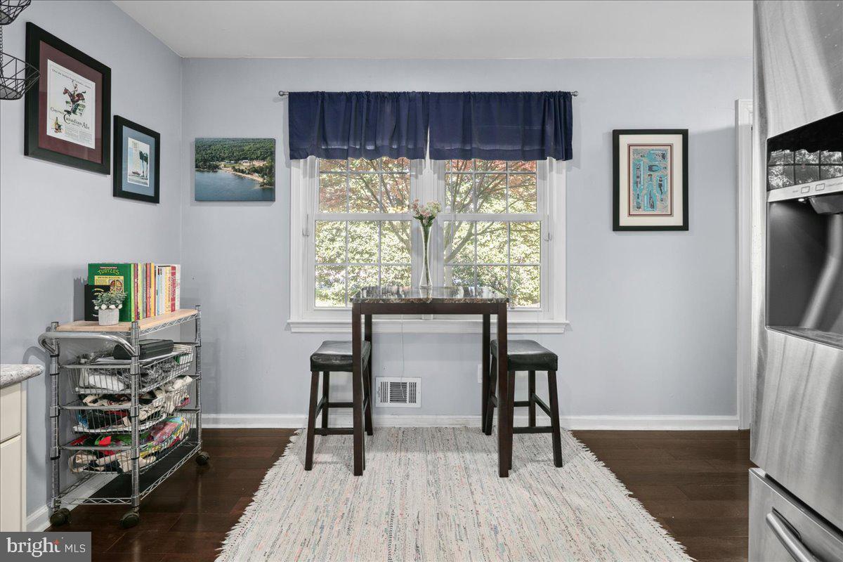 9623 Blake Lane Fairfax, VA 22031 - Photo 22 of 60 a view of a workspace with furniture and a window