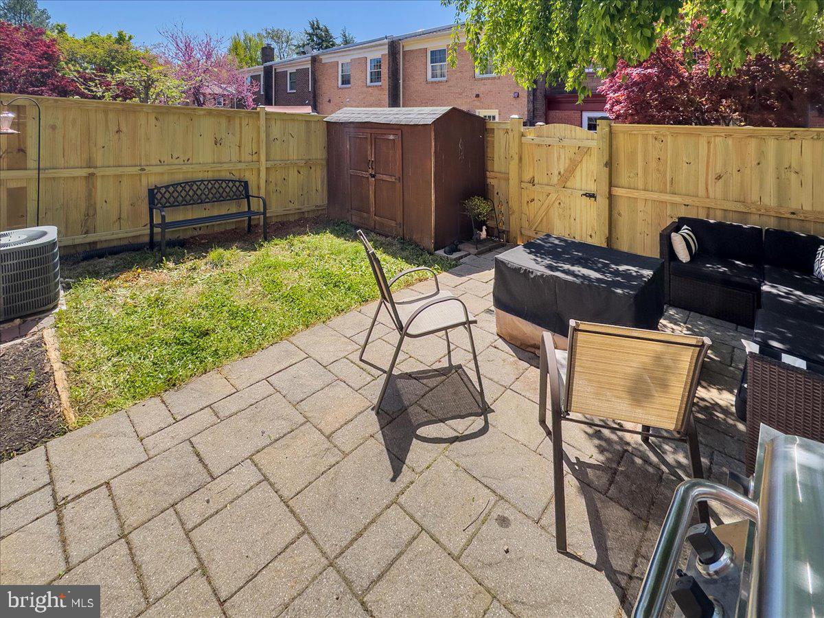 9623 Blake Lane Fairfax, VA 22031 - Photo 56 of 60 a view of a chairs and table in the patio