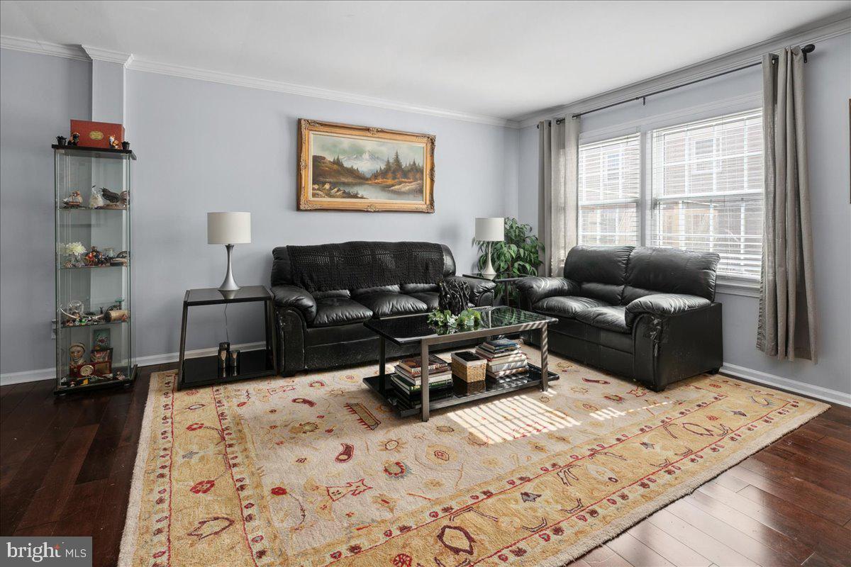 9623 Blake Lane Fairfax, VA 22031 - Photo 9 of 60 a living room with furniture window and wooden floor