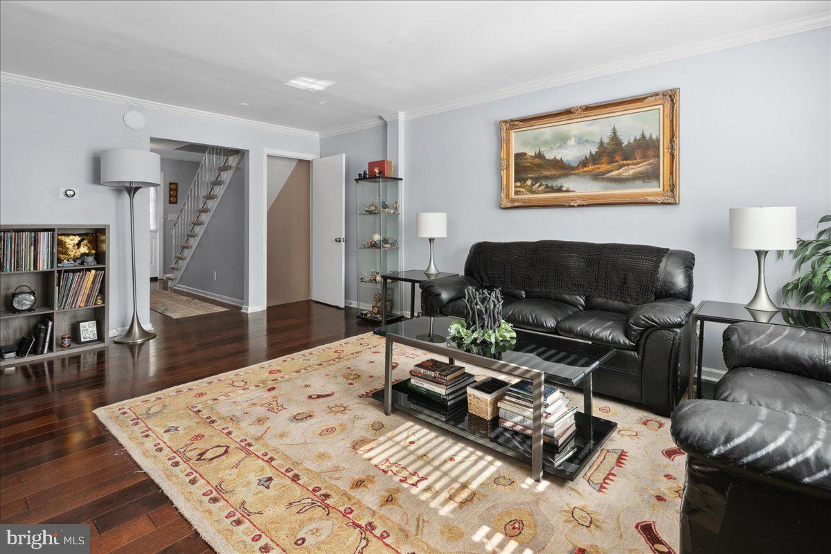 9623 Blake Lane Fairfax, VA 22031 - Photo 10 of 60 a living room with furniture and a wooden floor