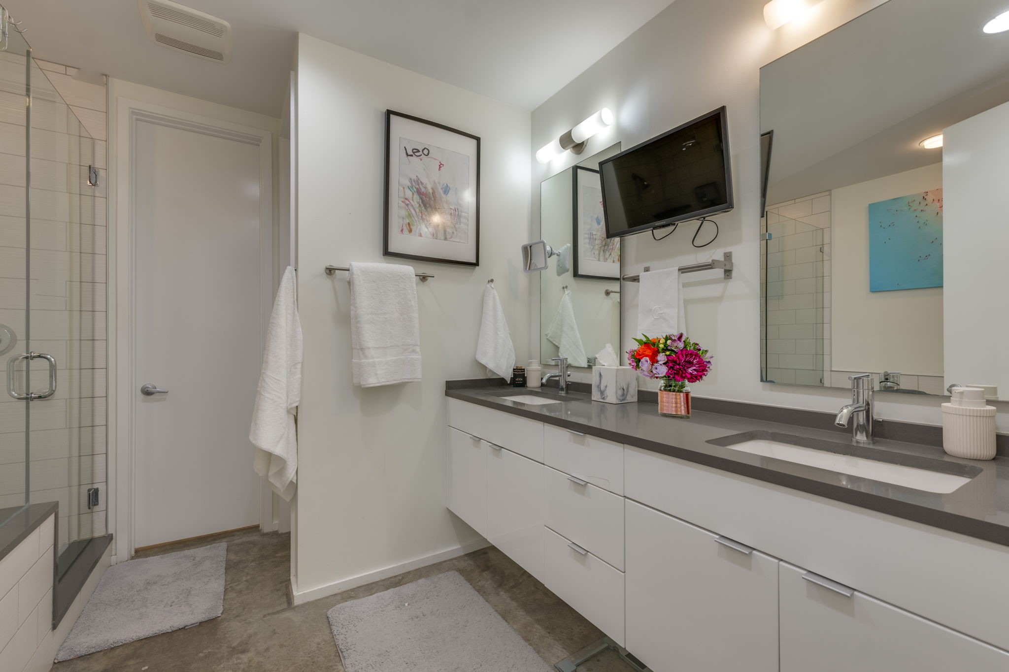 2301 South 5th Street, Unit 5 Austin, TX 78704 - Photo 26 of 39 Bathroom with a shower with door and vanity